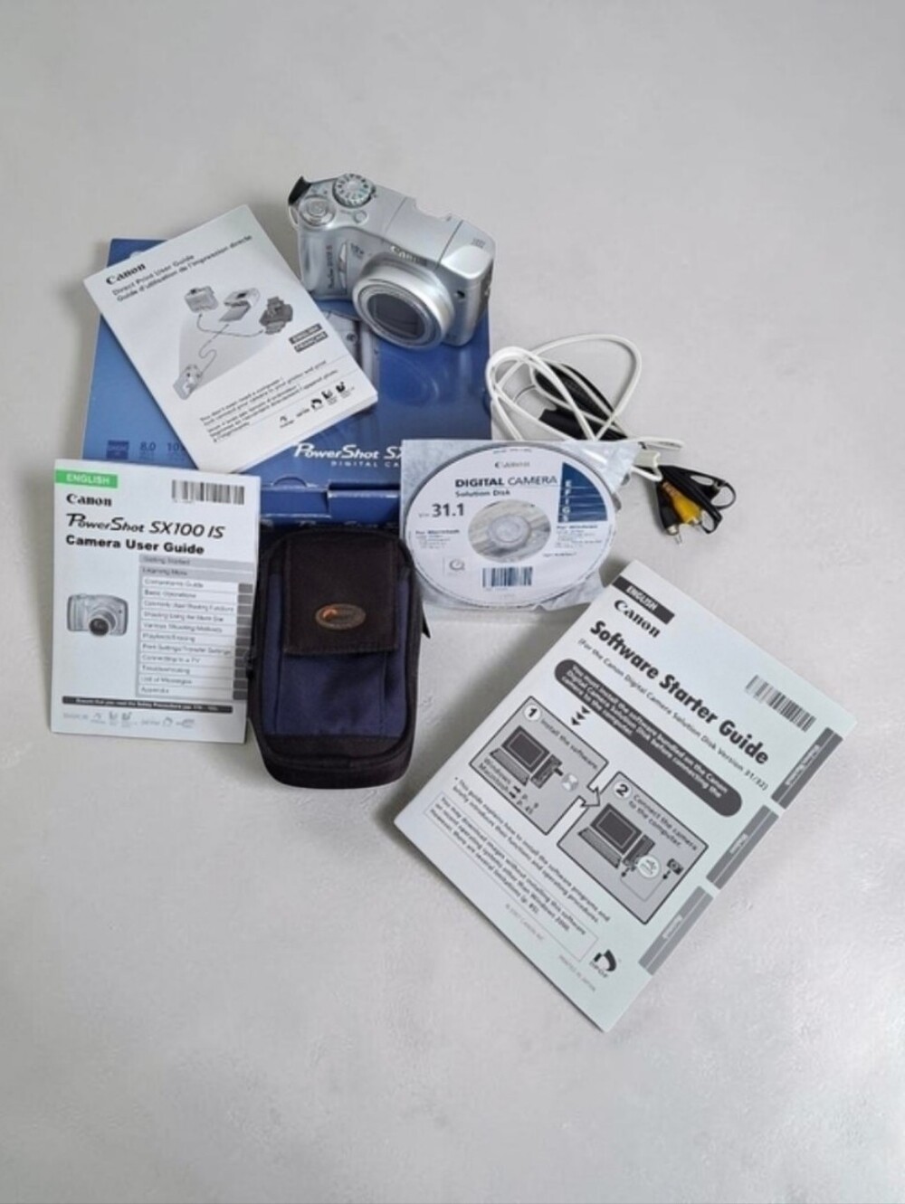 Canon PowerShot SX100 IS Digital Camera Silver Finish Original Box And +
